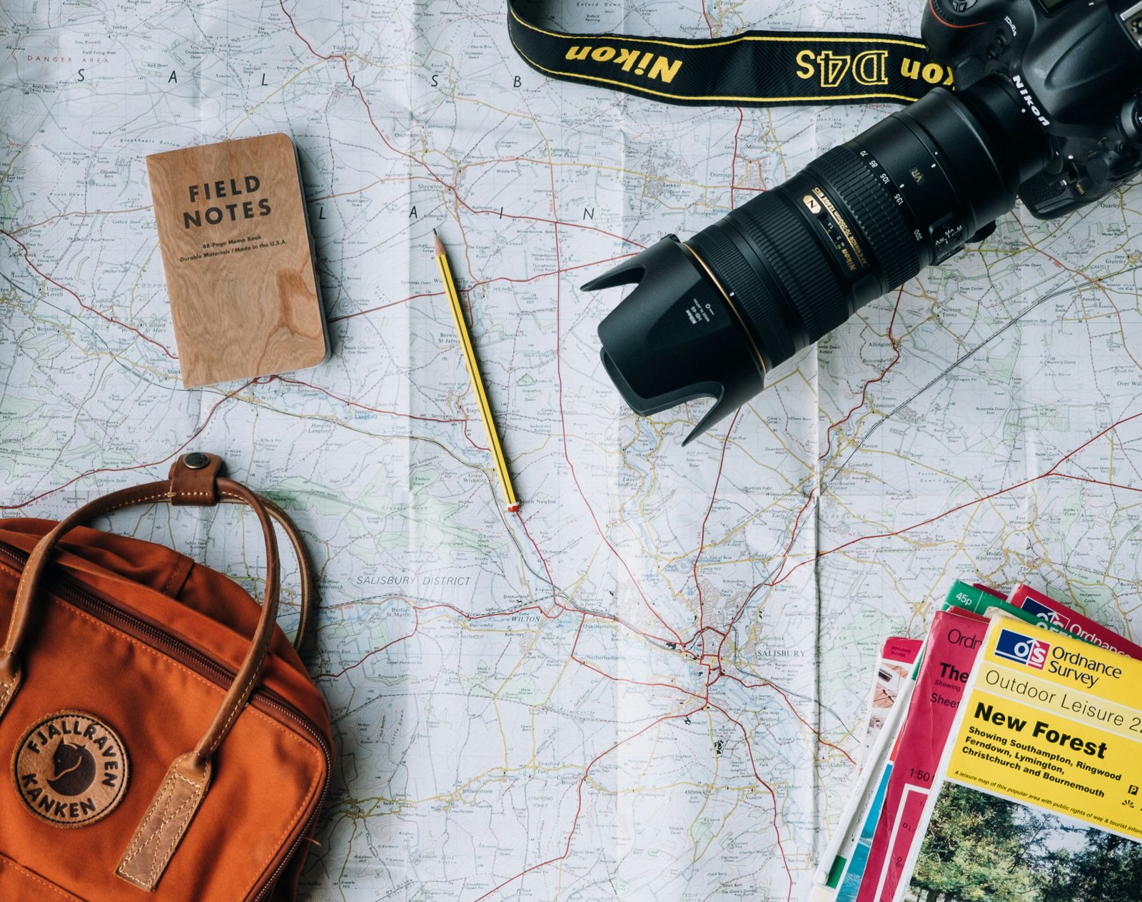 Worldview map with travelling equipment laid on top